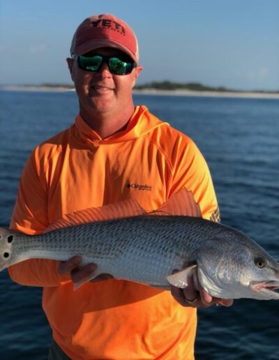 In Shore Fishing Client Holding Red Fish Mexico Gulf